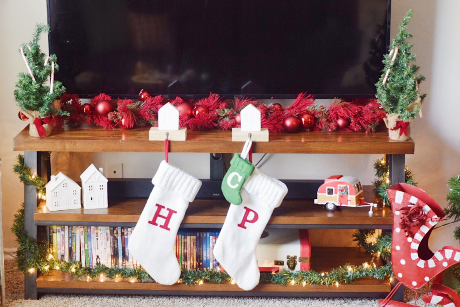 Christmas decorations on the TV stand  Christmas decorations, Tv