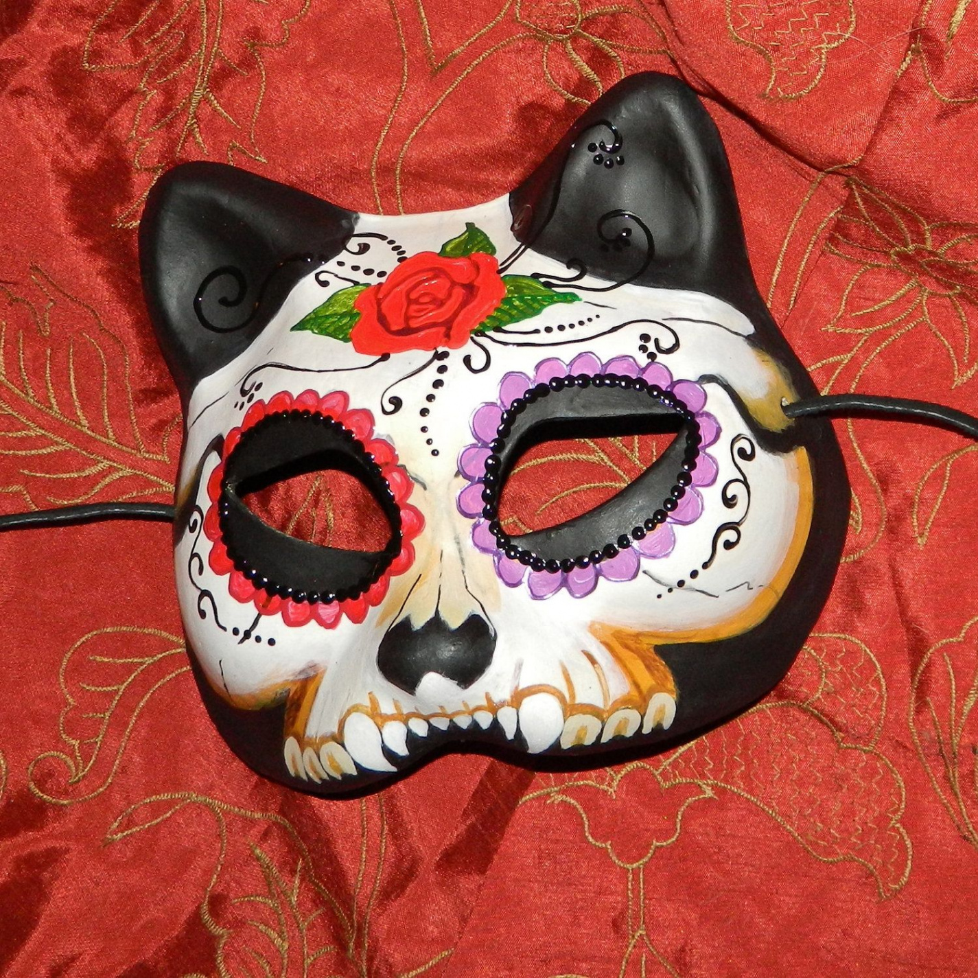 Day of the dead cat faces painting