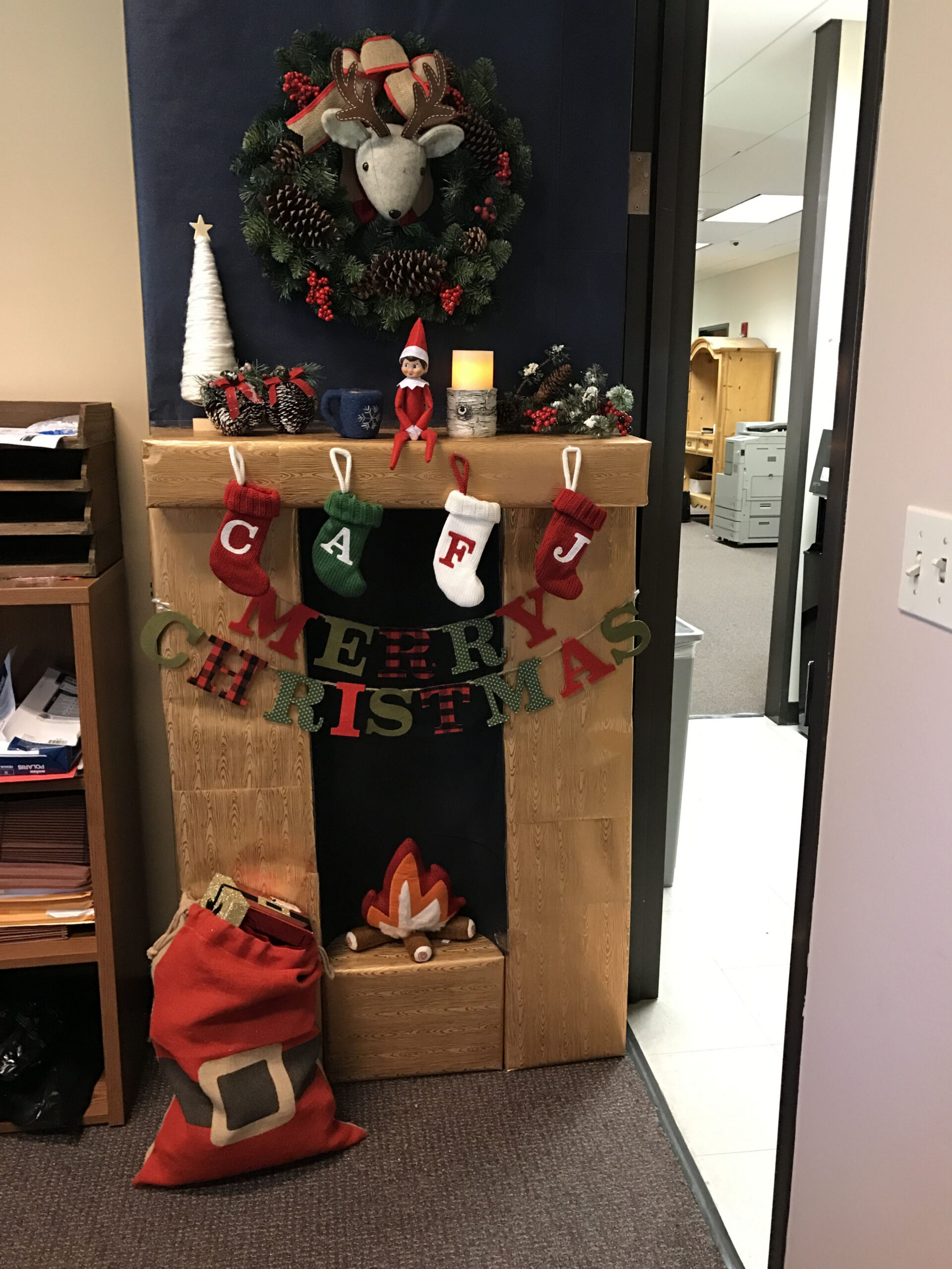 D office door for Christmas decorating contest with Elf on the