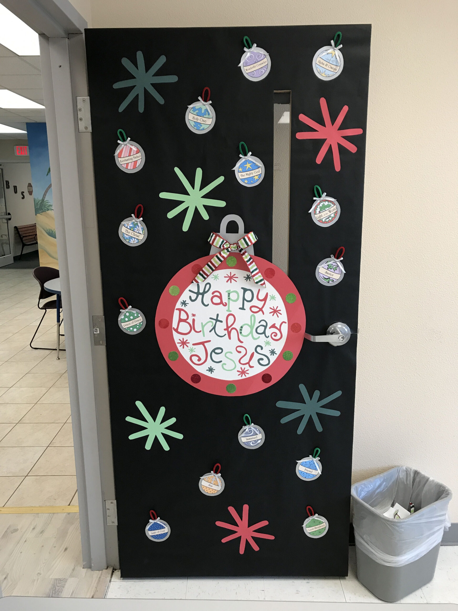 Festive Christmas Classroom Door with a "Happy Birthday Jesus" Theme