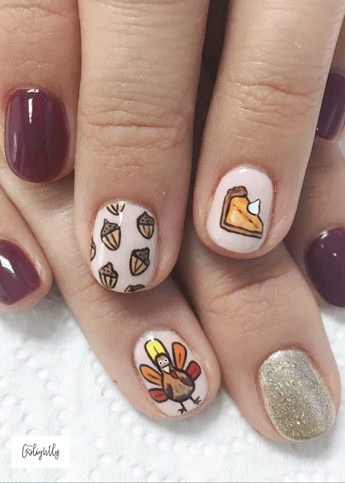 thanksgiving nail art designs ideas with acorns, pumpkin pie, and