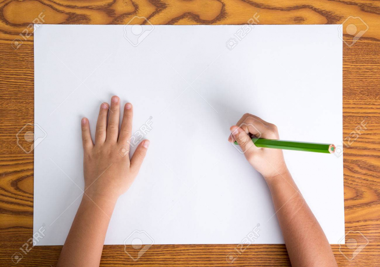 Childs Hands Drawing On A Blank Paper Stock Photo, Picture and