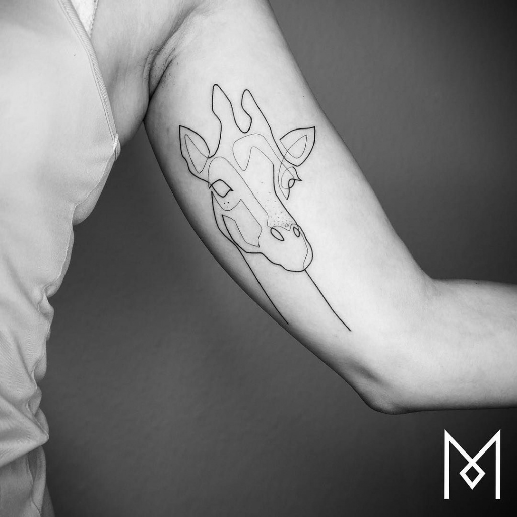 Mo Ganji giraffe tattoo  Giraffe tattoos, Line drawing tattoos